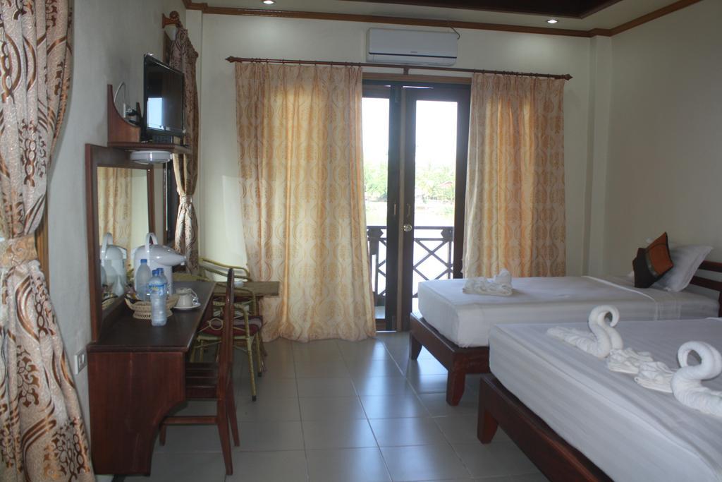 Sengahloune Villa Ban Khon Номер фото